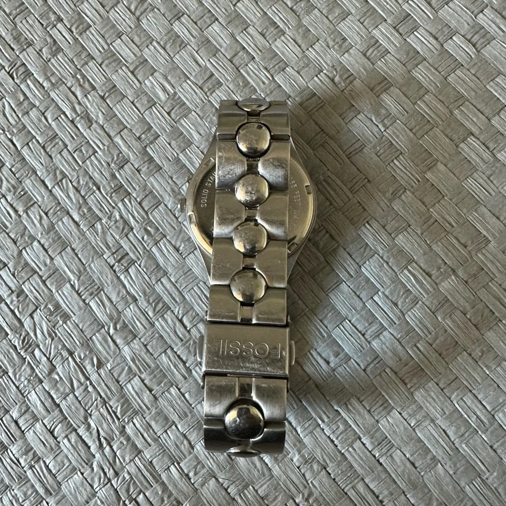 Fossil Blue and Silver Smartwatch with Elegant Design